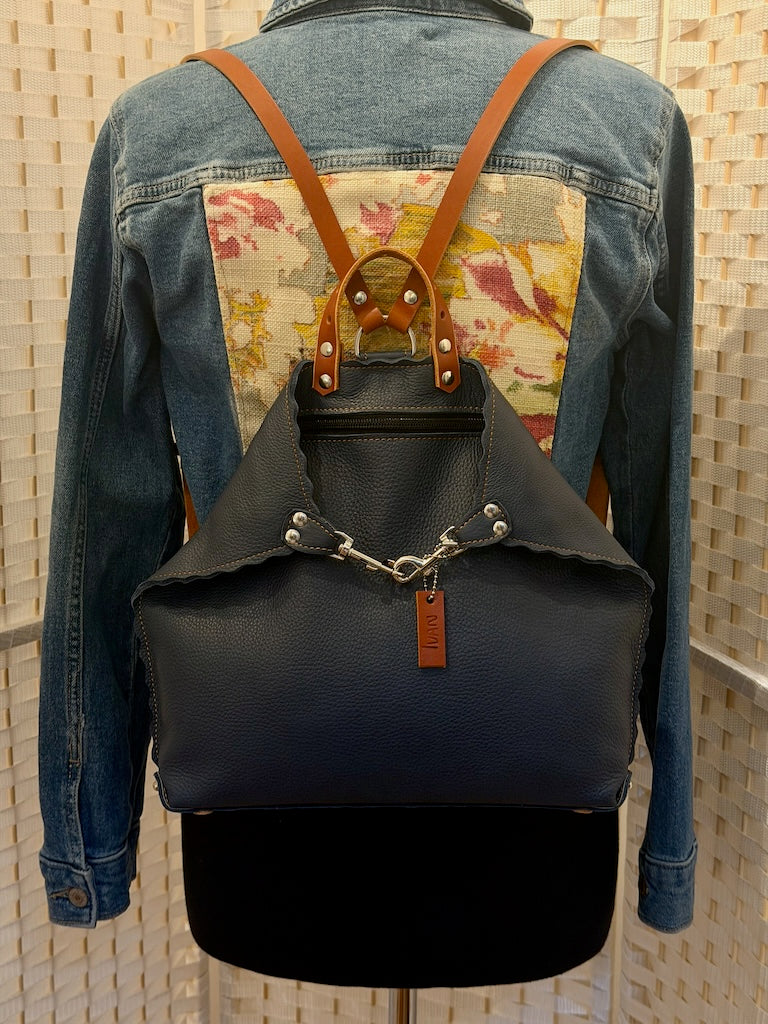 SMALL NAVY LEATHER BACKPACK WITH BROWN STRAPS AND SCALLOPED EDGES II322