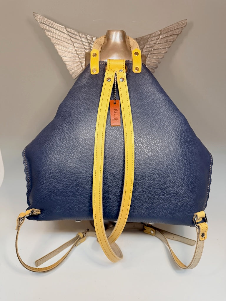 LARGE BLUE LEATHER BACKPACK WITH SCALLOPED EDGES AND YELLOW TRIM - II327