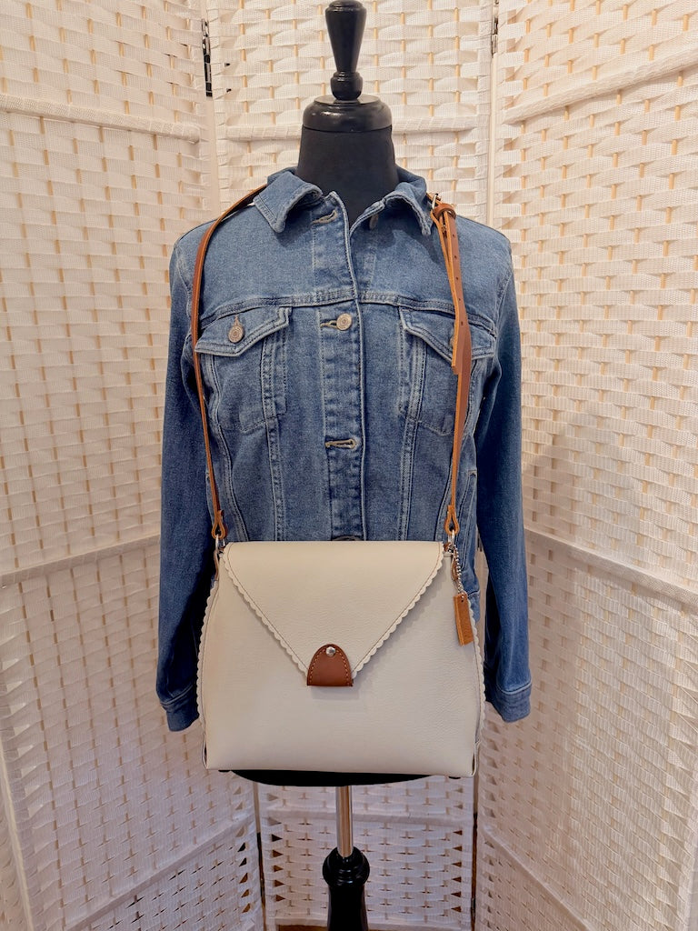 IVORY LEATHER FLAP TOP BAG WITH ADJUSTABLE CROSSBODY STRAP - II377