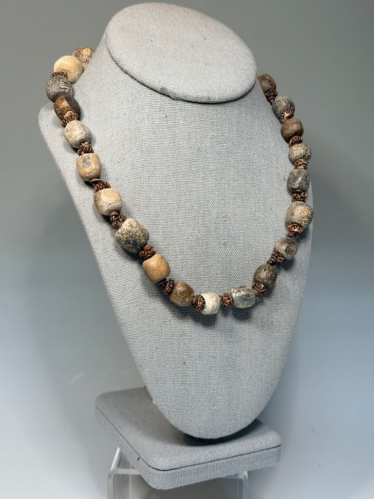 DINOSAUR BONE BEAD AND COPPER NECKLACE WITH HAND KNOTTED LEATHER LCN2028