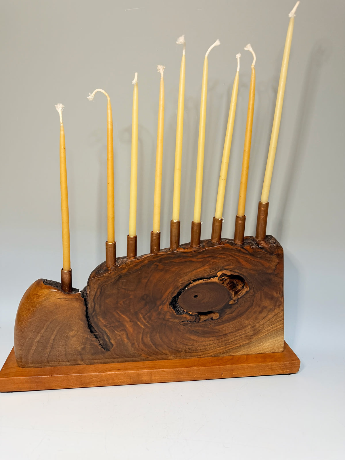 WALNUT MENORAH ON CHERRY BASE