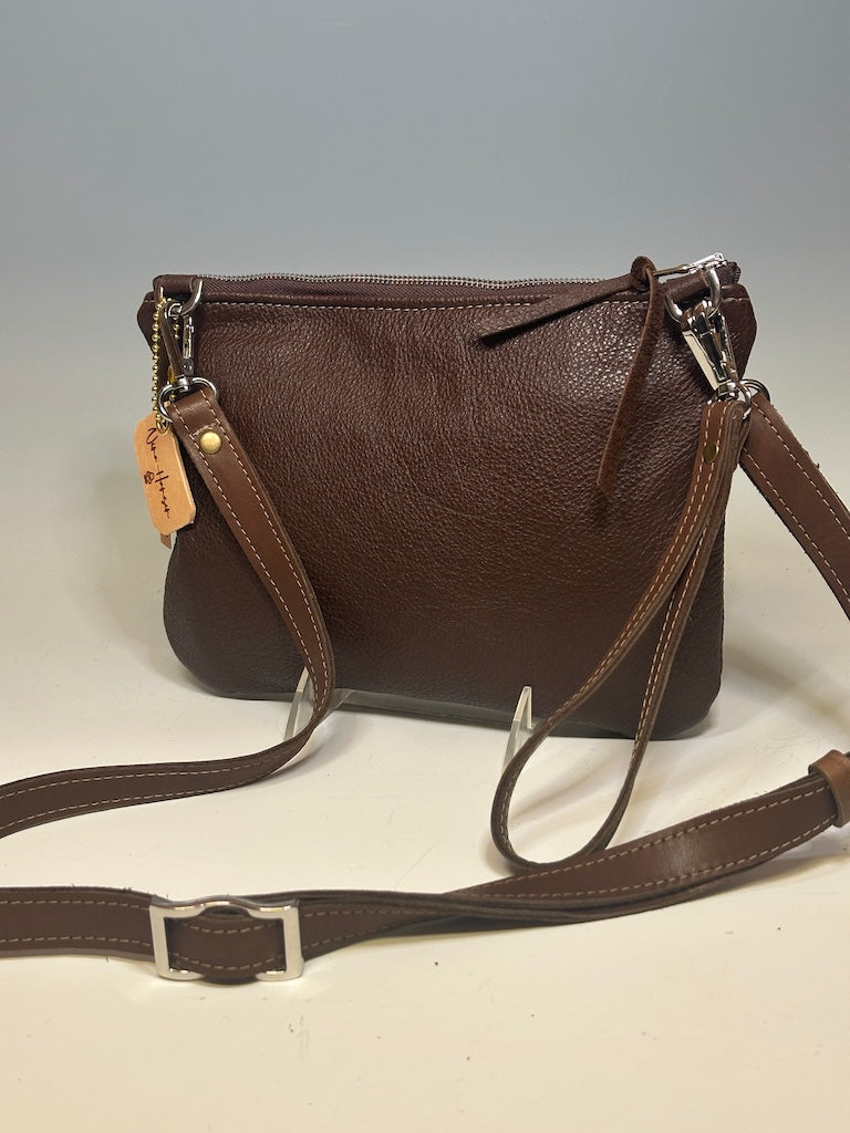 3 WAY LEATHER/TAPESTRY CROSSBODY/WRISTLET/HAND HELD IN BROWN FLORAL NH138