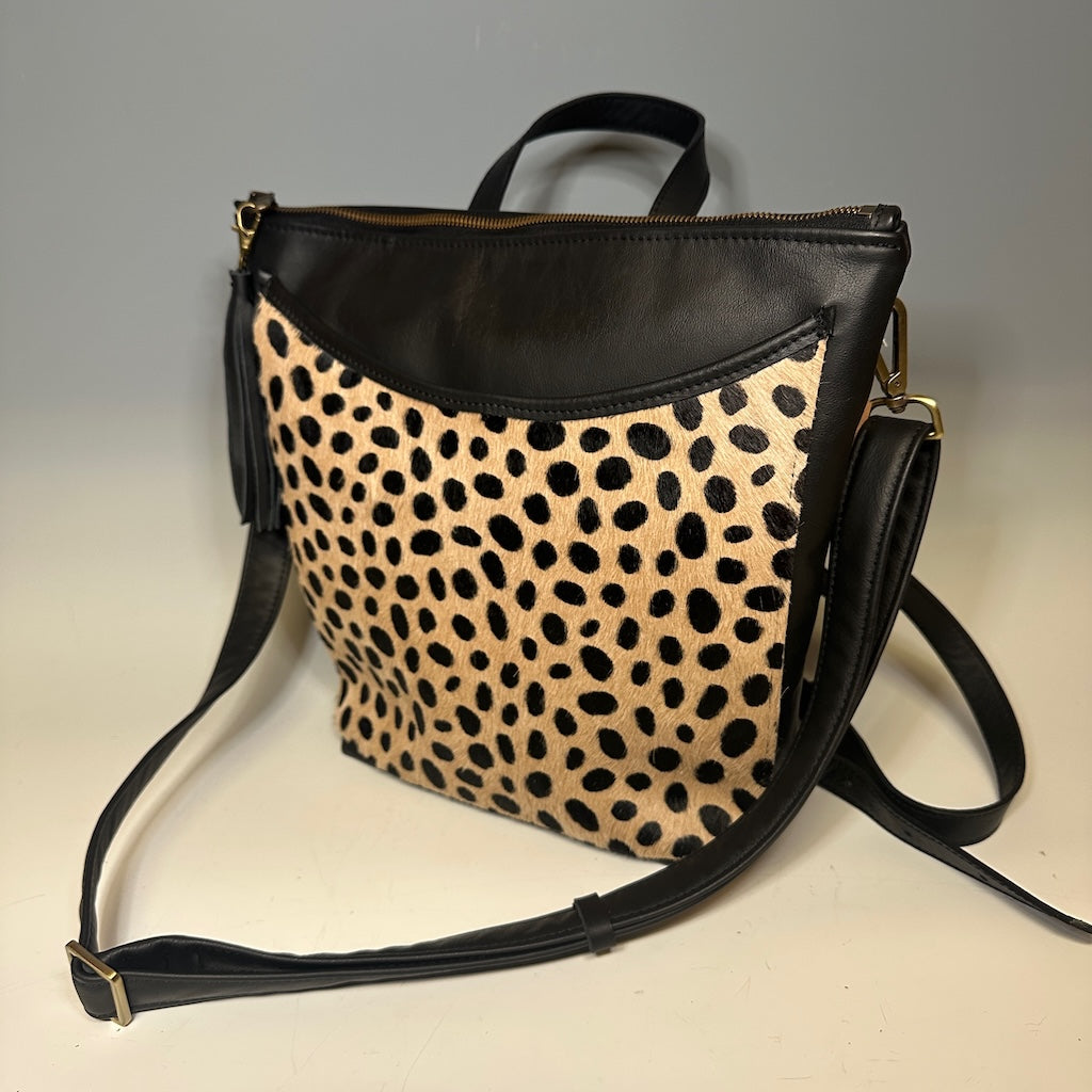 THE LAUREL CONVERTIBLE LEATHER BACKPACK/CROSSBODY BAG IN BLACK SPOTTED HIDE NH151