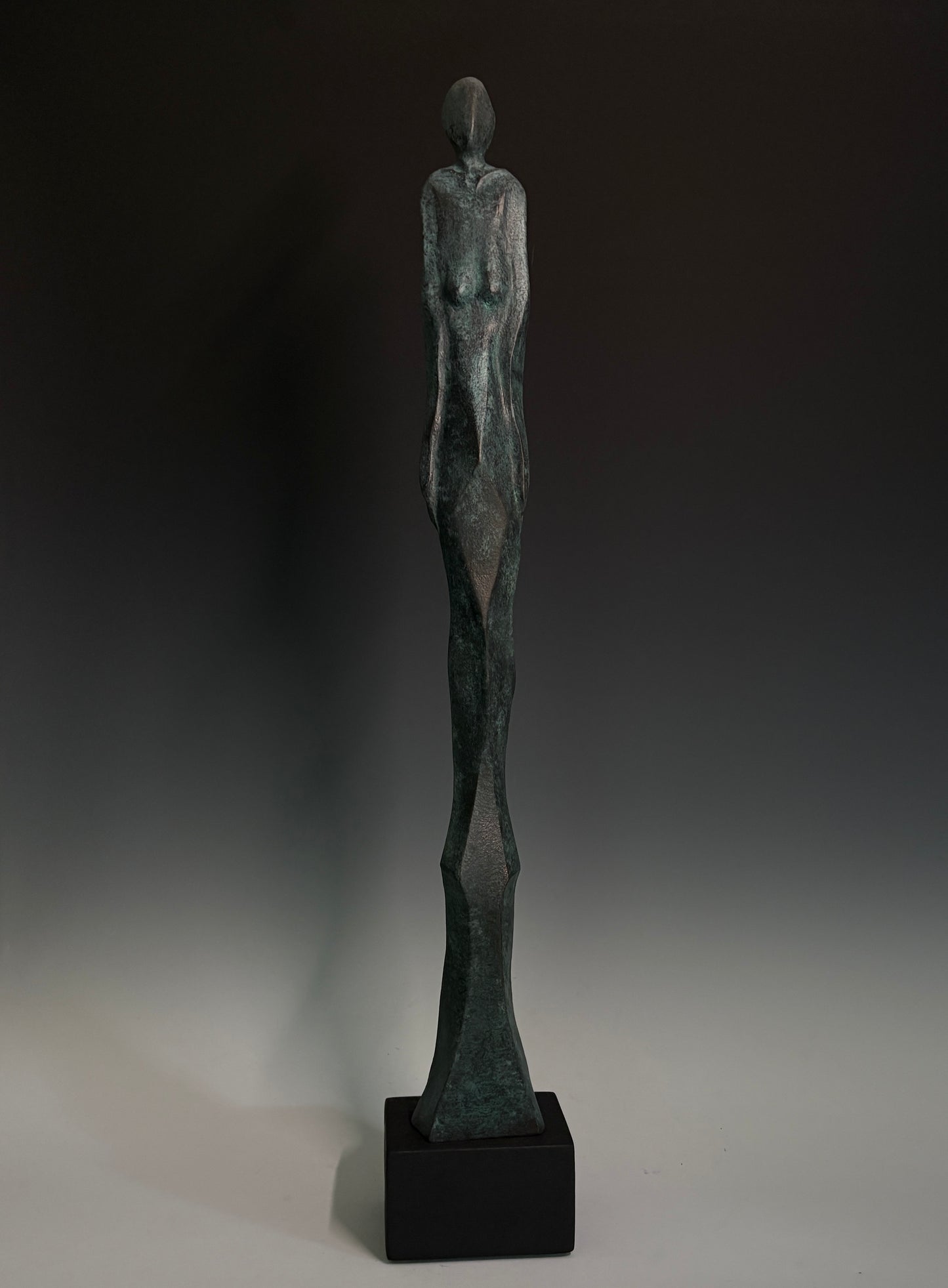 "UNBROKEN DIGNITY" HAND CARVED WHITE PINE WITH OXIDIZED BRONZE COATING SCULPTURE