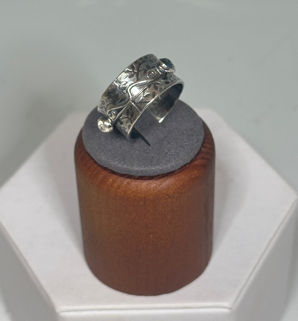 .925 TEXTURED TWIDDLE RING WITH AQUAMARINE, CLEAR MOONSTONE AND BLUE TOPAZ BR488