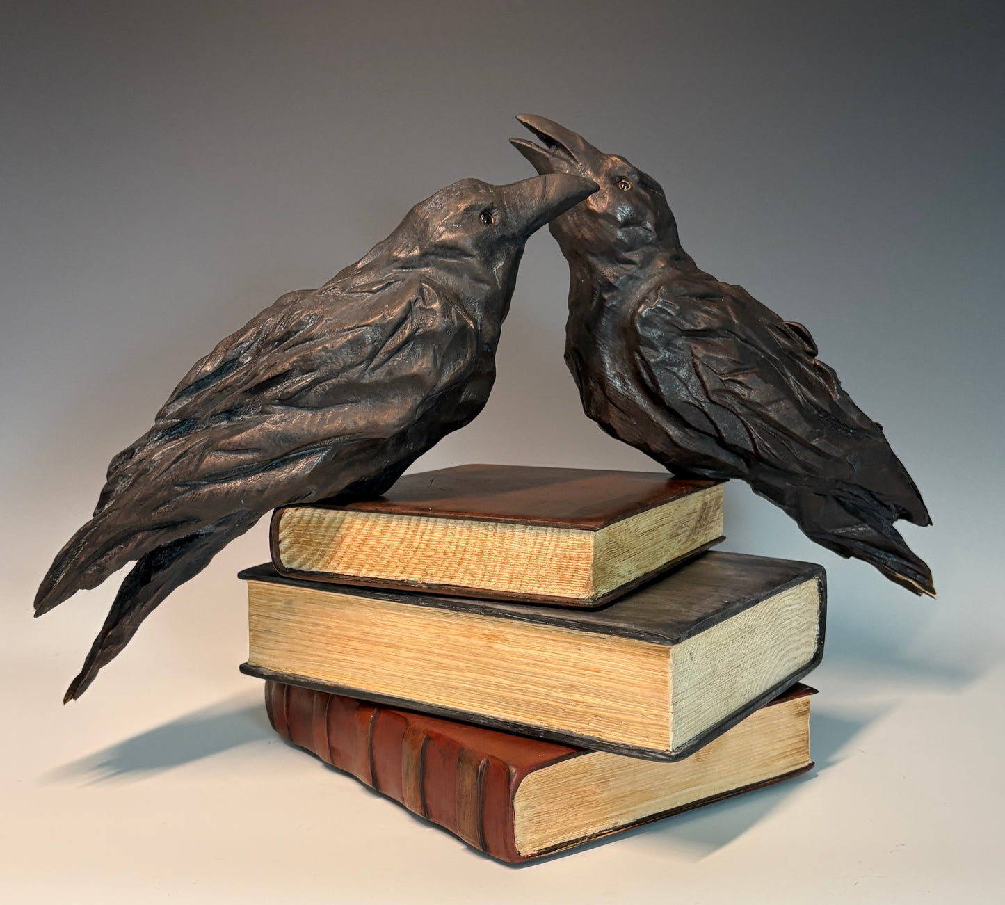 "BOOK TALK" HAND CARVED WHITE PINE SCULPTURE