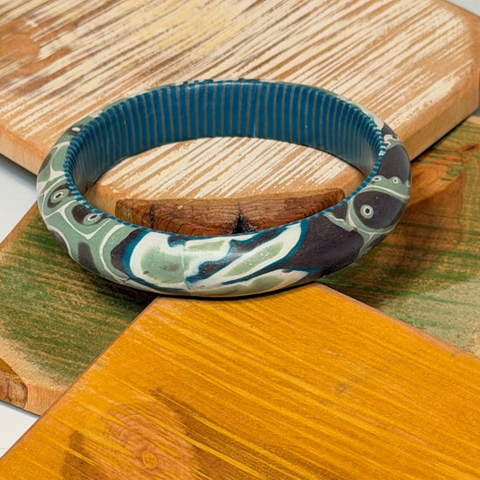 MULTI COLORED POLYMER CLAY BANGLE BRACELET WITH STRIPED INTERIOR PATTERN PCBL870