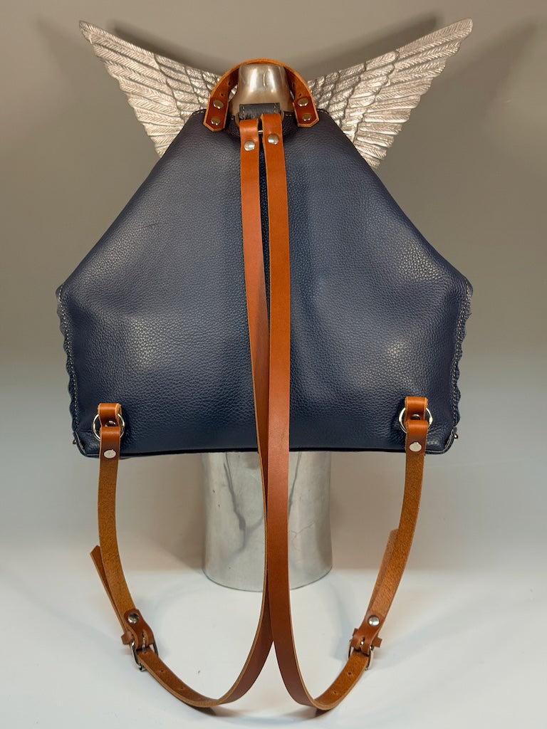SMALL NAVY LEATHER BACKPACK WITH BROWN STRAPS AND SCALLOPED EDGES II322