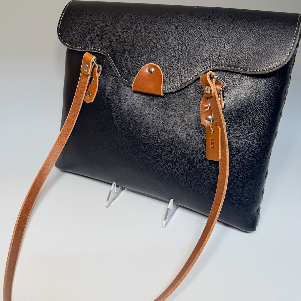MEDIUM BLACK AND BROWN FRONT FLAP TOTE WITH MAGNETIC CLOSURE II325
