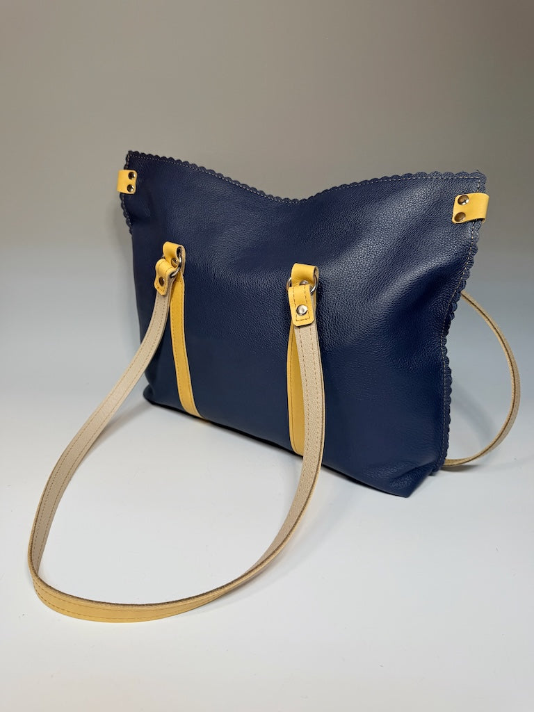 BLUE LEATHER ZIP TOTE WITH SCALLOPED EDGES AND YELLOW TRIM II326