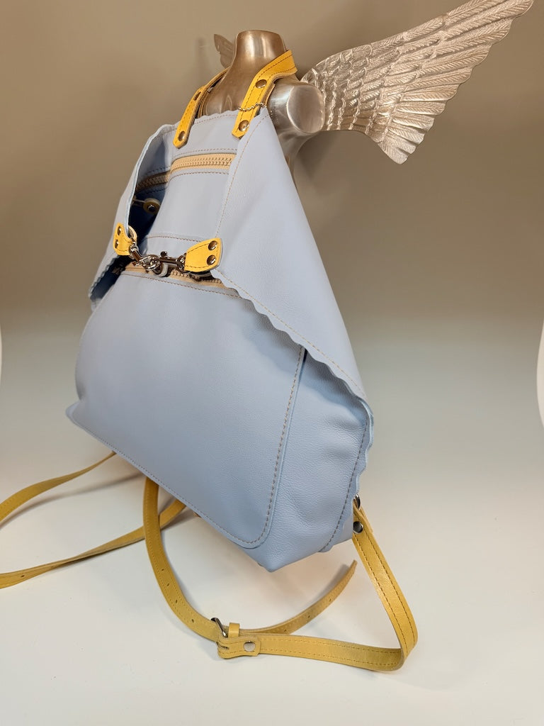 LARGE SKY BLUE LEATHER BACKPACK WITH YELLOW STRAPS, FRONT POCKET AND SCALLOPED EDGES II327