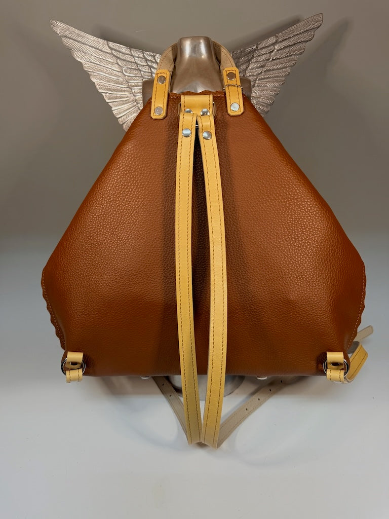LARGE RUST LEATHER BACKPACK WITH YELLOW STRAPS, FRONT POCKET AND SCALLOPED EDGES II327R