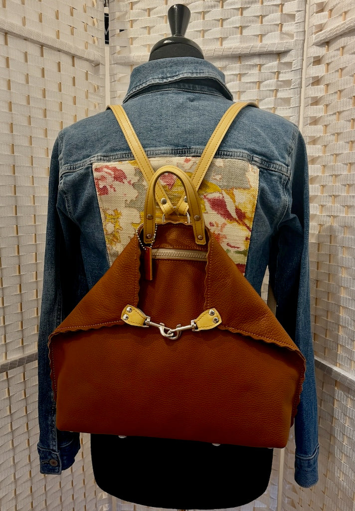 LARGE RUST LEATHER BACKPACK WITH YELLOW STRAPS, FRONT POCKET AND SCALLOPED EDGES II327R