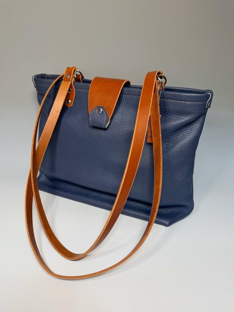 BLUE LEATHER OPEN TOTE WITH BROWN ACCENTS & MAGNETIC FLAP CLOSURE II331
