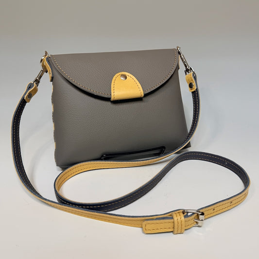 SMALL GREY LEATHER FLAP BAG WITH YELLOW TRIM AND FLAP TOP - II336