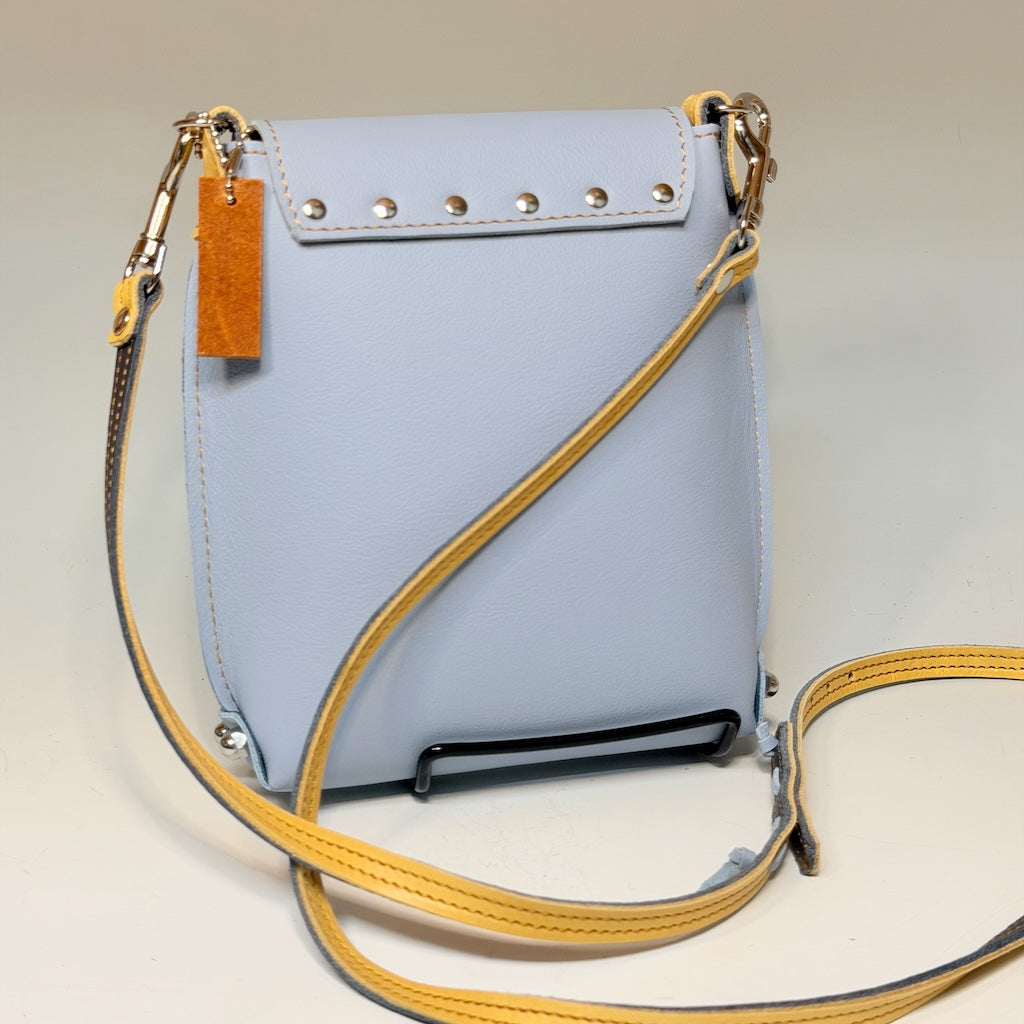 SMALL SKY BLUE LEATHER BAG WITH YELLOW TRIM AND FLAP TOP - II359