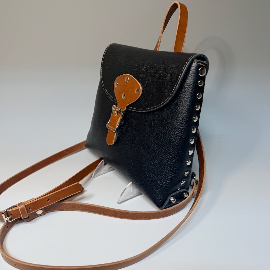 SMALL BLACK AND BROWN BACKPACK WITH RIVETS II404