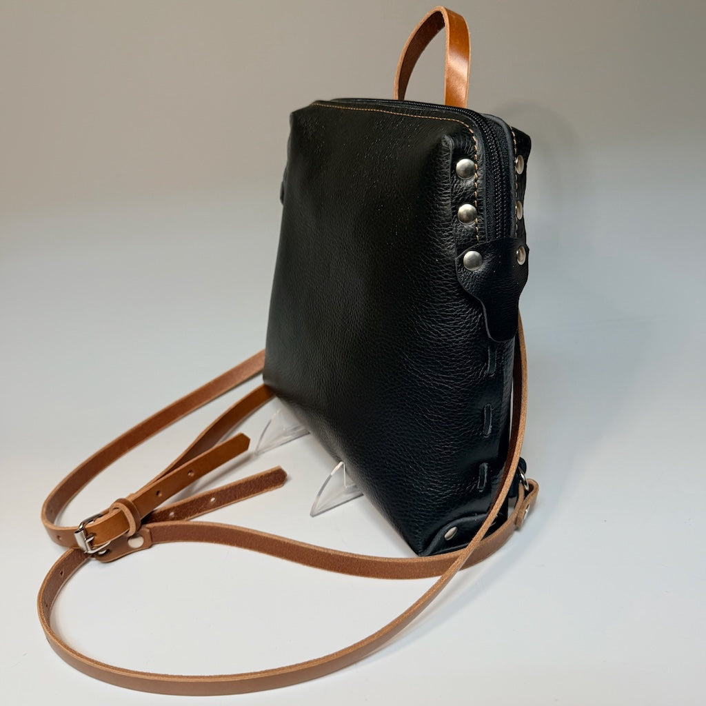 SMALL BLACK AND BROWN BACKPACK WITH RIVETS AND TOP ZIPPER II410