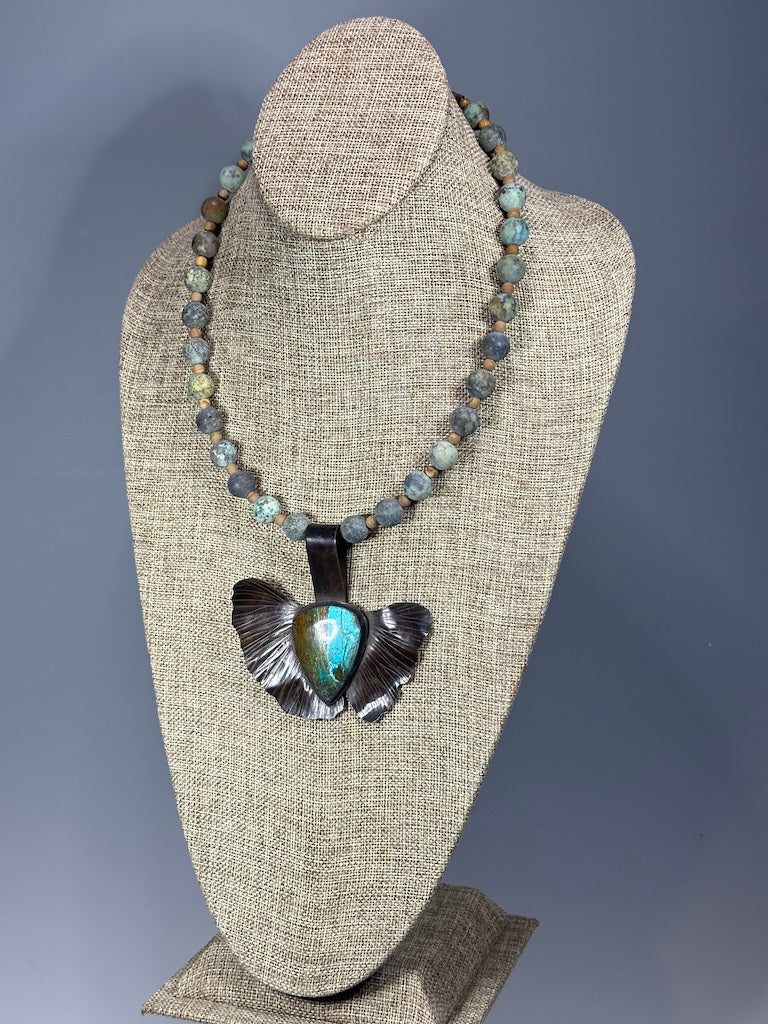 RESILIENCE COPPER GINKGO WITH AZURITE SHATTUCKITE TEAR SHAPED CABOCHON, AFRICAN TURQUOISE AND MATTE WOOD GRAIN JASPER BEAD NECKLACE JH148