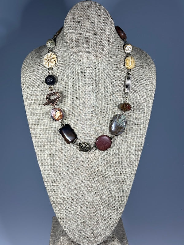 MIXED METAL AND STONE STATEMENT NECKLACE WITH COPPER HEART TOGGLE LCN1097