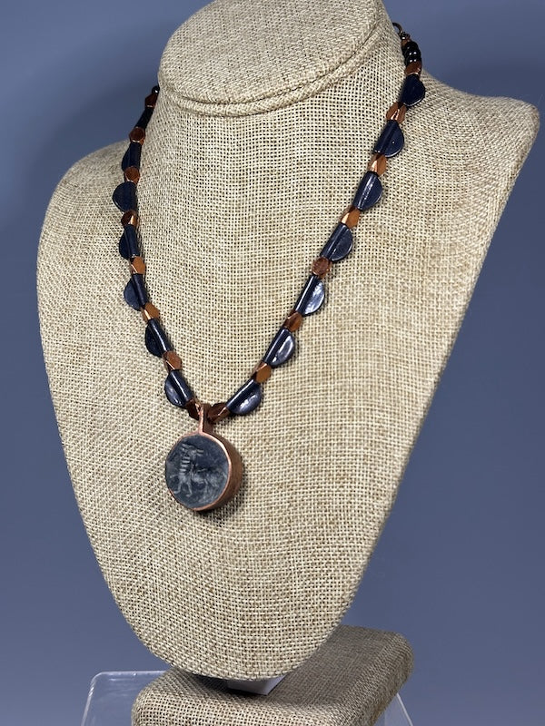 BLACK AND COPPER METAL NECKLACE WITH FOSSIL FOCAL PENDANT LCN1098