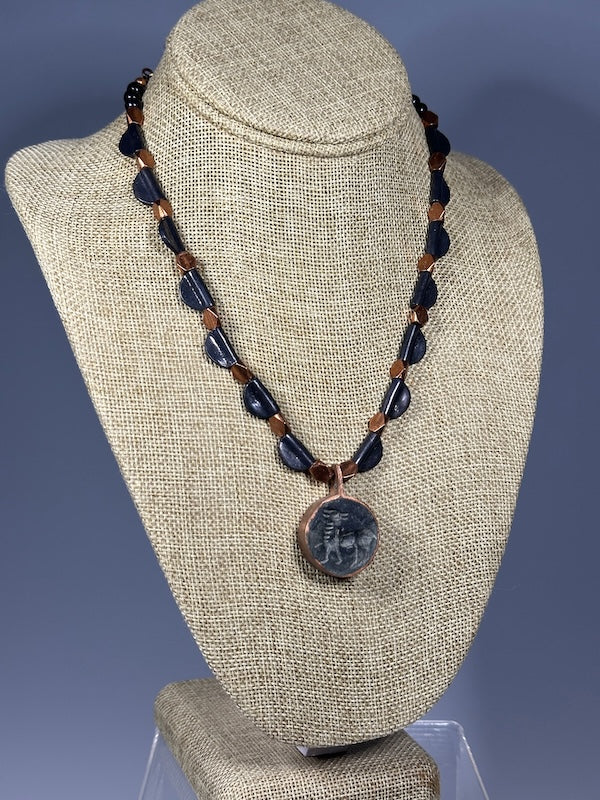 BLACK AND COPPER METAL NECKLACE WITH FOSSIL FOCAL PENDANT LCN1098