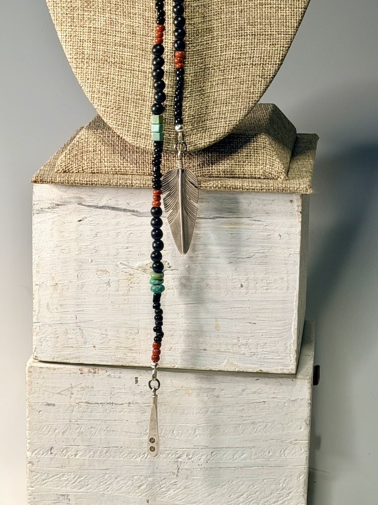 TURQUOISE, CORAL AND BLACK BEAD LARIAT WITH STERLING SILVER FEATHER LCN2047