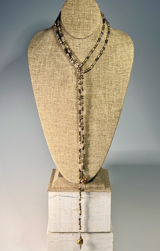 MIXED METAL AND CRYSTAL LARIAT WITH TORCHED COPPER HEART CHARMS LCN2048