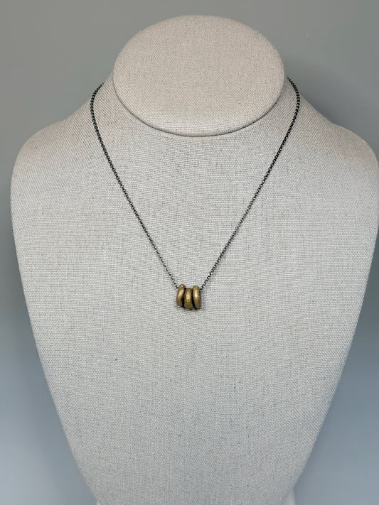 OXIDIZED STERLING SILVER NECKLACE WITH TRIPLE BRASS HOOPS LCN3016