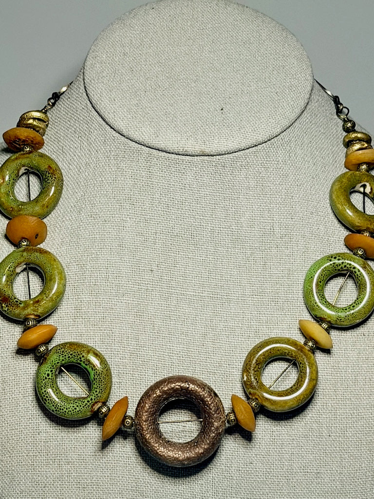 CERAMIC CIRCLE NECKLACE WITH AFRICAN TRADE BEADS AND COPPER CENTER CIRCLE PENDANT LCN3039