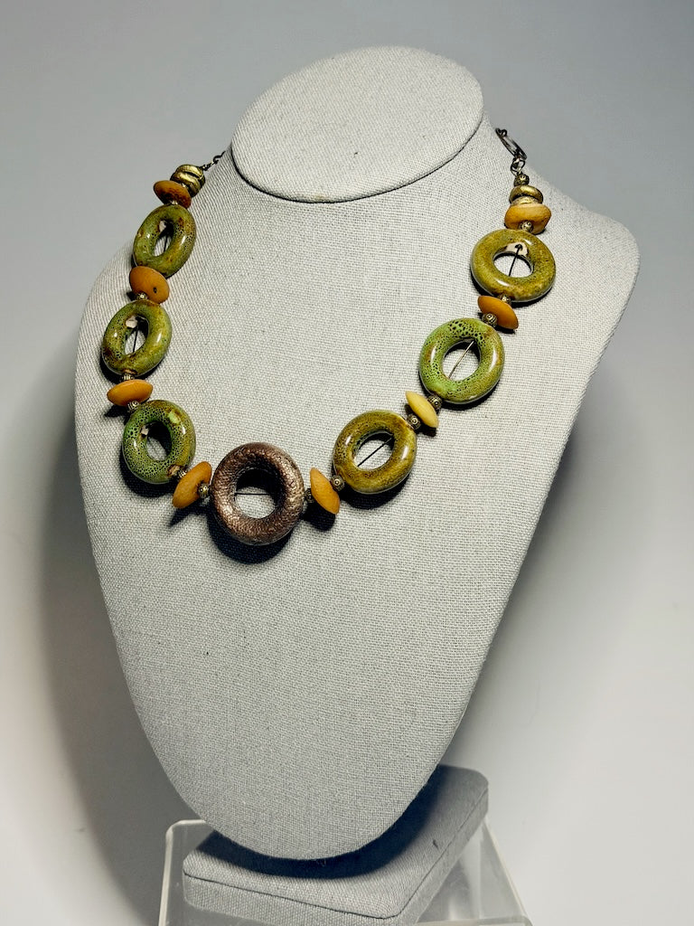 CERAMIC CIRCLE NECKLACE WITH AFRICAN TRADE BEADS AND COPPER CENTER CIRCLE PENDANT LCN3039