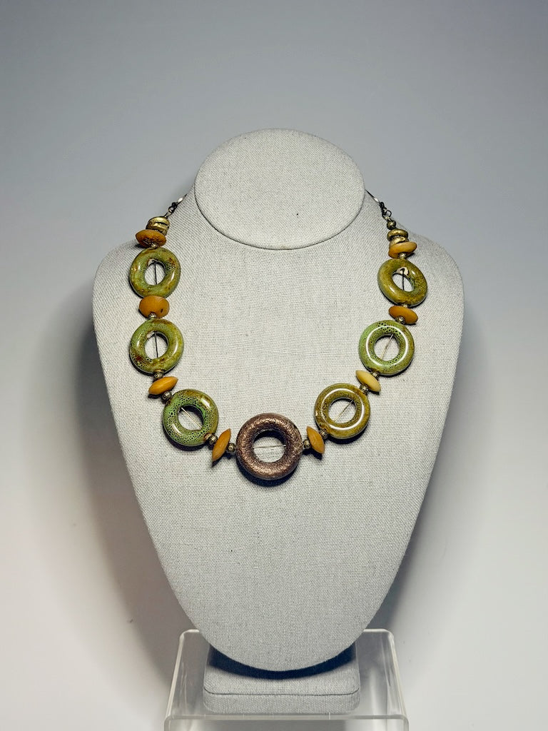 CERAMIC CIRCLE NECKLACE WITH AFRICAN TRADE BEADS AND COPPER CENTER CIRCLE PENDANT LCN3039