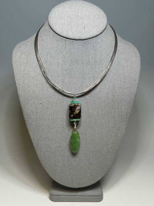 CHRYSOCOLLA STATEMENT PENDANT ON MULTI STRAND STAINLESS STEEL NECK WIRE LCN988