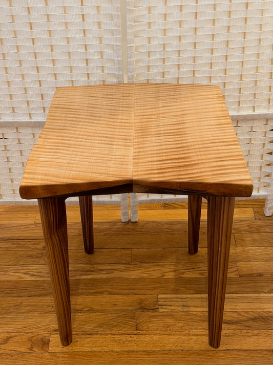 BOOKMATCHED TIGER MAPLE TABLE WITH WALNUT LEGS