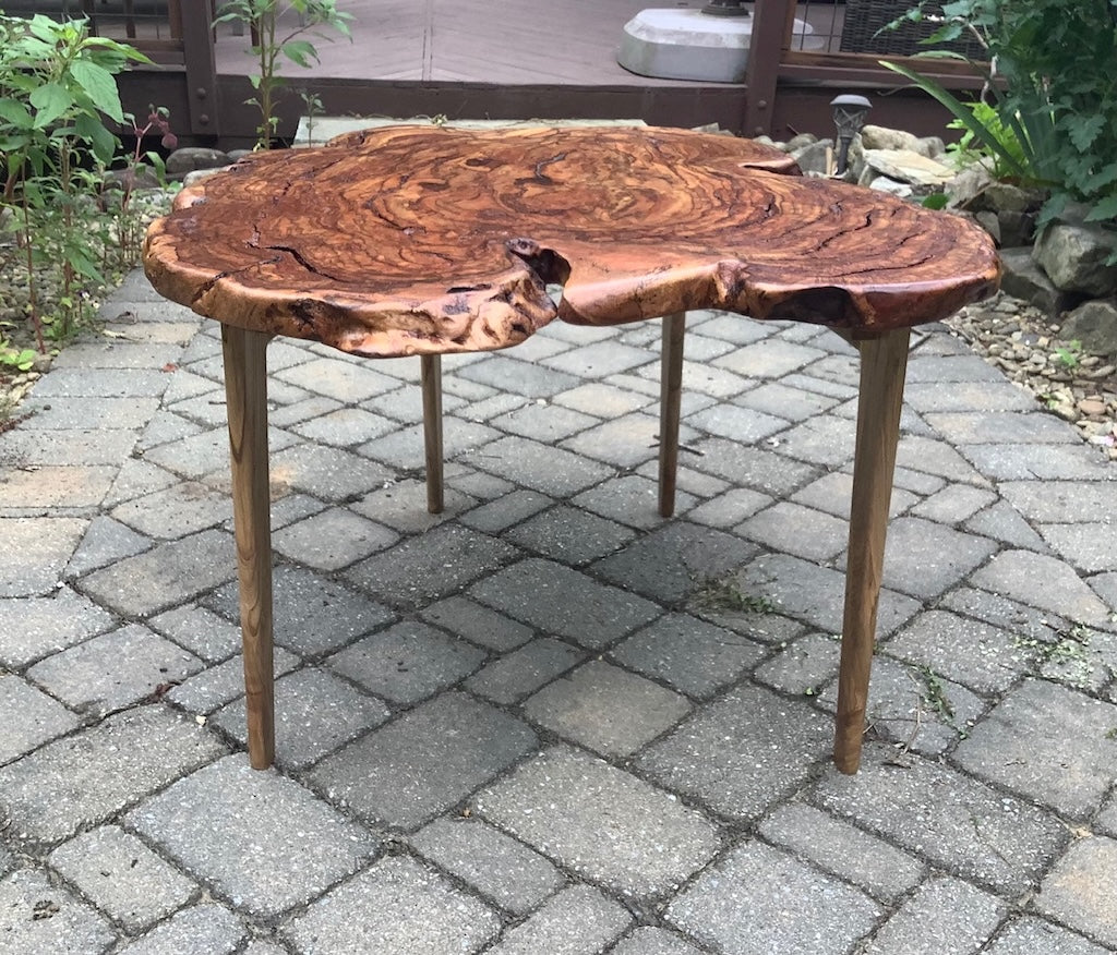 RED OAK BURL COFFEE TABLE WITH AMBROSIA MAPLE LEGS