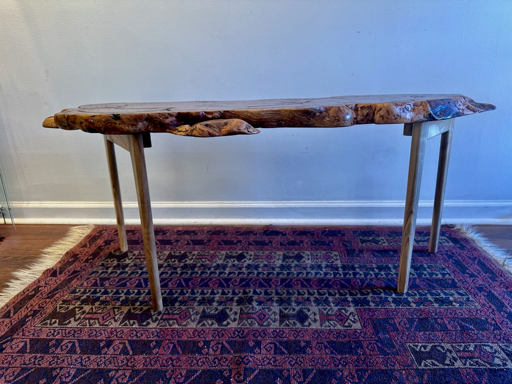 RED OAK BURL COFFEE TABLE WITH AMBROSIA MAPLE LEGS