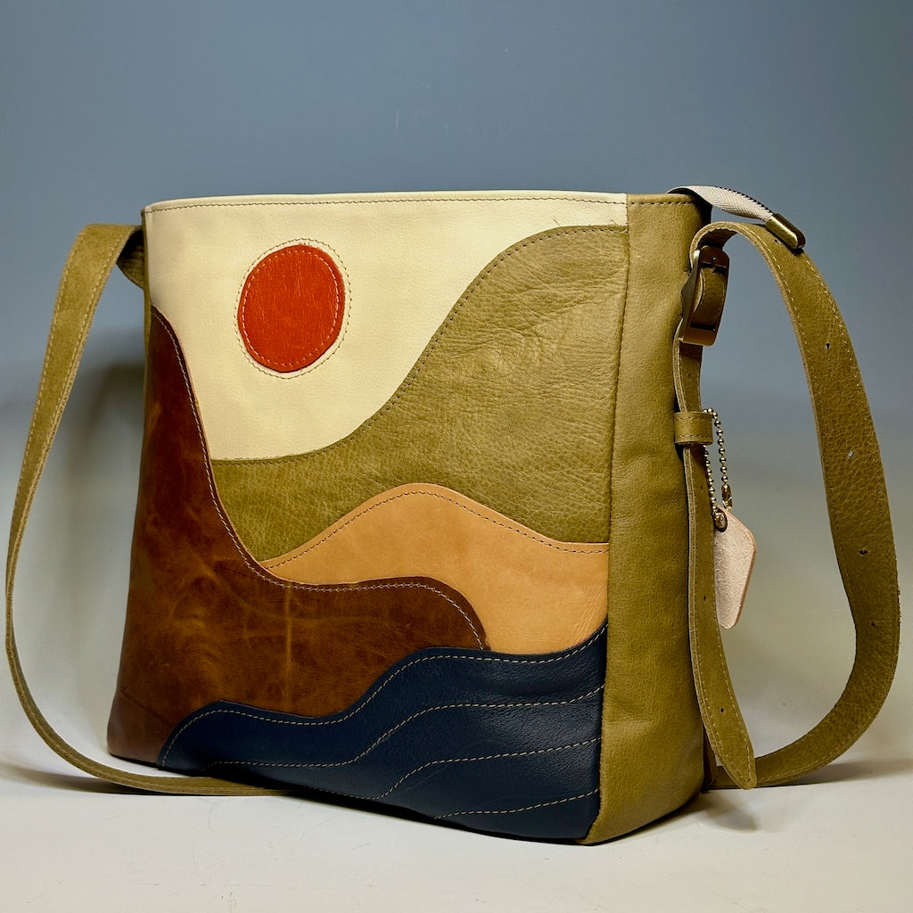 LEATHER ZIPPERED "MOUNTAIN TO SEA" TOTE WITH FRINGE TASSEL NH141