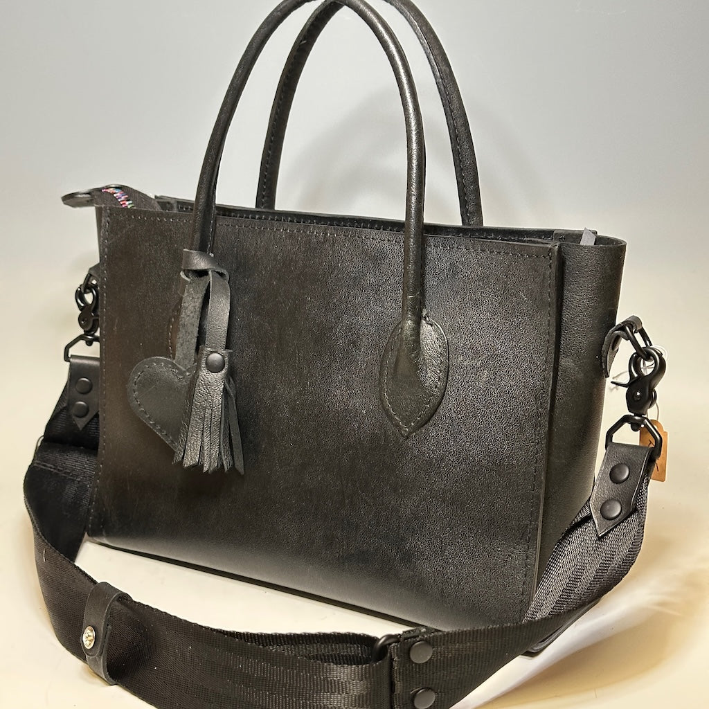 LADY IN BLACK LEATHER CROSSBODY/HAND HELD HANDBAG WITH HEART ACCENTS & MULTICOLOR ZIPPER IN BLACK NH144
