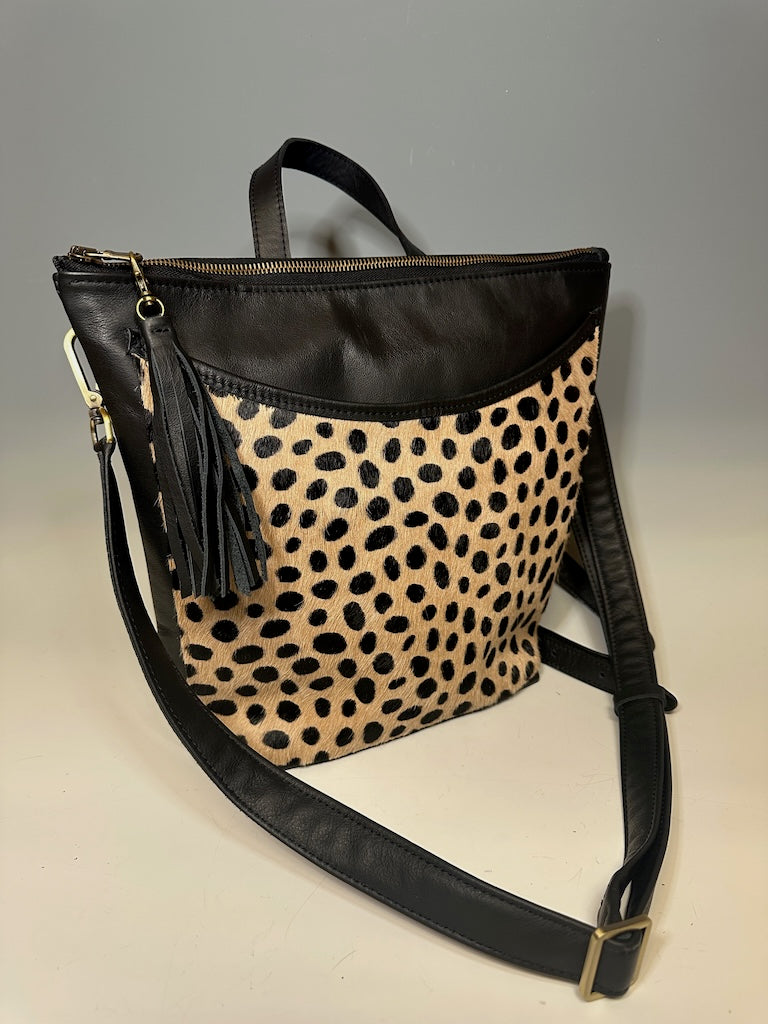 THE LAUREL CONVERTIBLE LEATHER BACKPACK/CROSSBODY BAG IN BLACK SPOTTED HIDE NH151