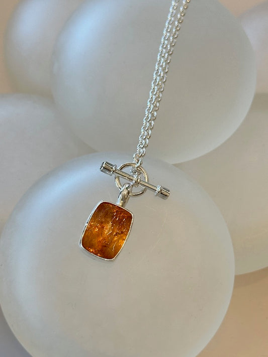 IMPERIAL TOPAZ  STERLING SILVER NECKLACE WITH MANDARIN GARNET TOGGLE - NM572N