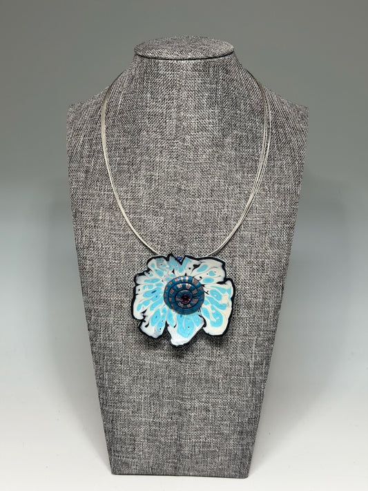 FLORAL POLYMER CLAY PENDANT WITH SWAROVSKI CRYSTAL CENTER ON MULTI STRAND STAINLESS STEEL NECK WIRE PCN880