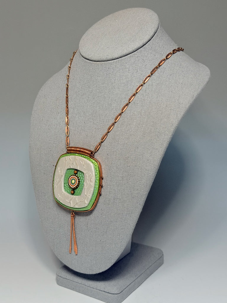 ROUNDED, LAYERED SOFT-COLORED SQUARE PENDANT WRAPPED IN COPPER WITH HAND HAMMERED COPPER PADDLE FRINGE PCN897