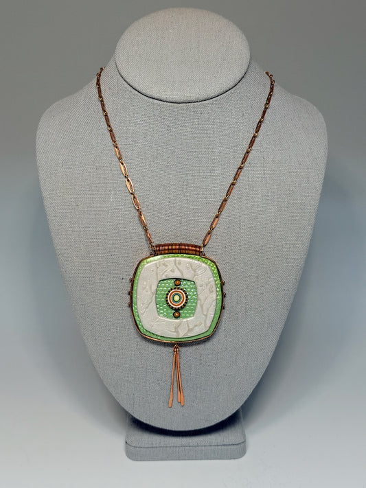 ROUNDED, LAYERED SOFT-COLORED SQUARE PENDANT WRAPPED IN COPPER WITH HAND HAMMERED COPPER PADDLE FRINGE PCN897
