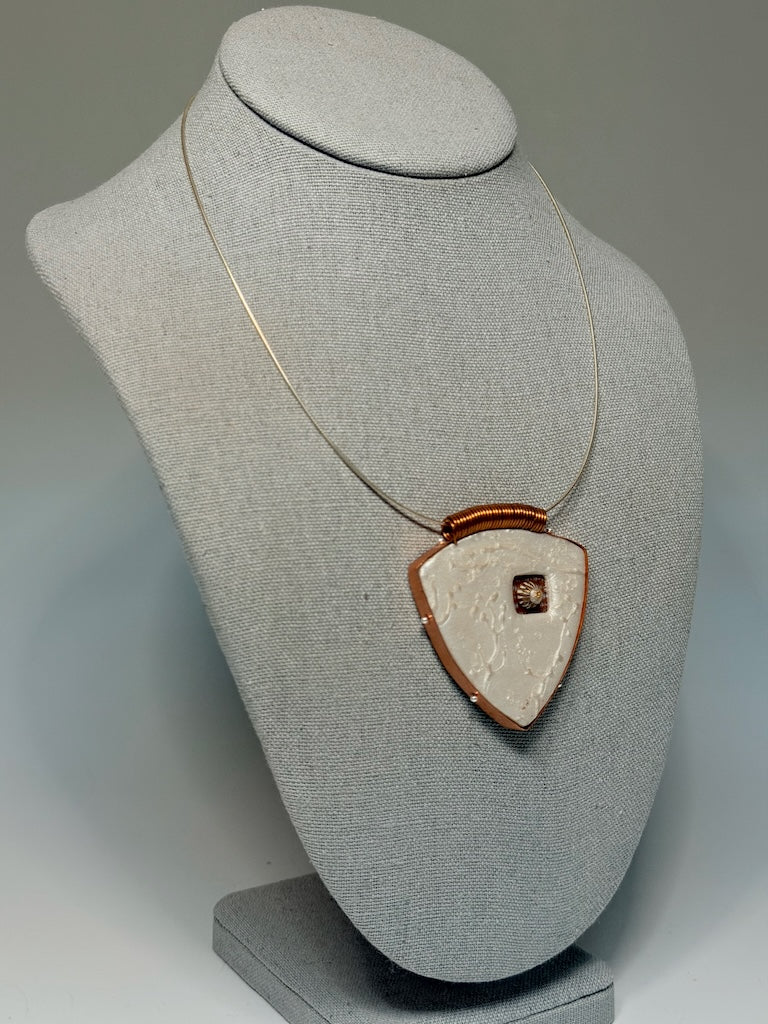 ROUNDED TRIANGLE PENDANT WRAPPED IN COPPER METAL PCN899