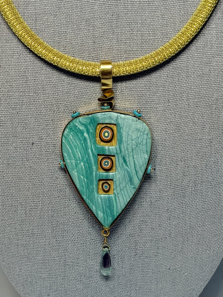 PETAL SHAPED PENDANT WITH CUT OUT WINDOWS WRAPPED IN BRASS METAL WITH GLASS DROP CHEQUE BEAD FRINGE AND TURQUOISE HESHI BEAD ACCENTS PCN900