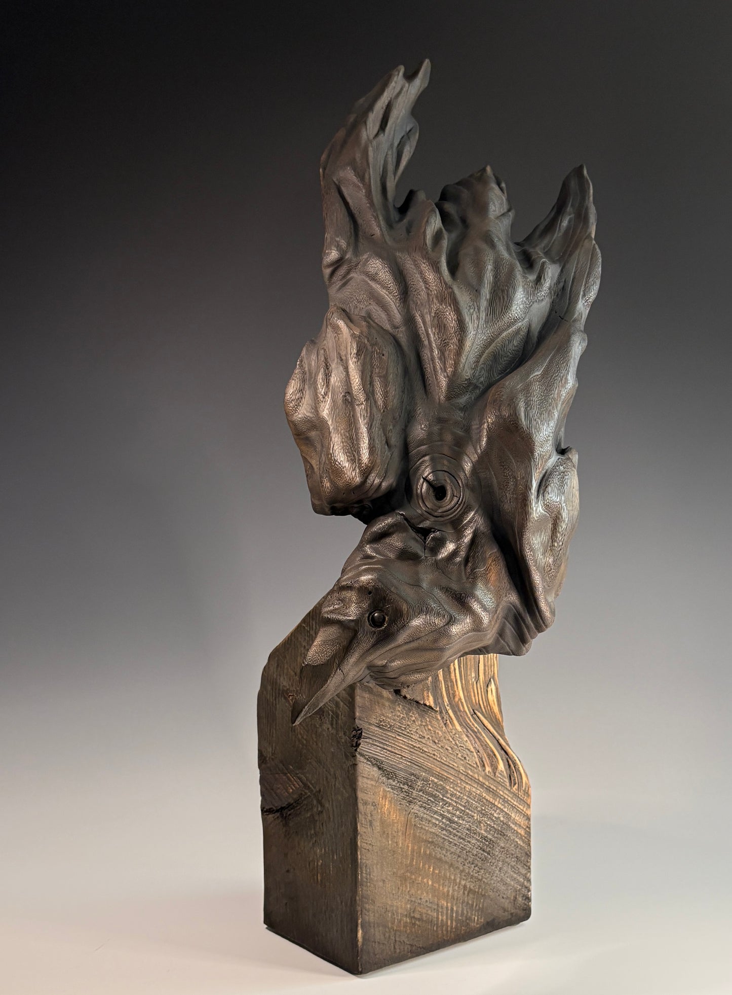 "RAVEN'S BREATH" HAND CARVED PAULOWNIA SCULPTURE