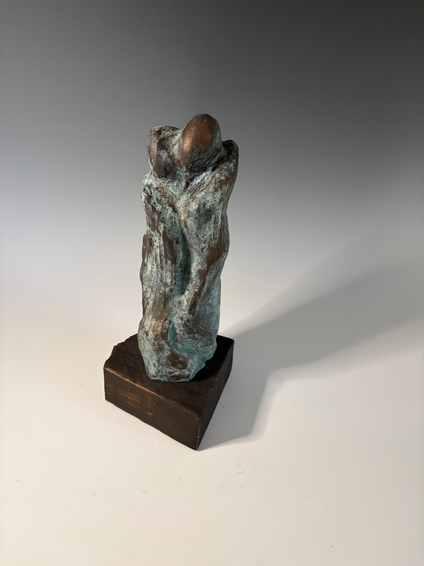 "REFUGE" HAND CARVED DOUGLAS FIR SCULPTURE WITH BRONZE COATING