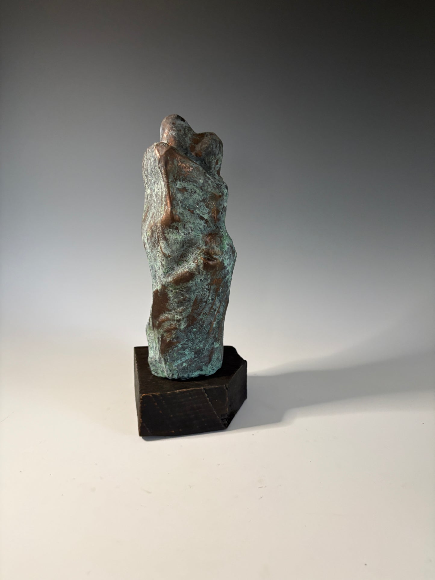 "REFUGE" HAND CARVED DOUGLAS FIR SCULPTURE WITH BRONZE COATING