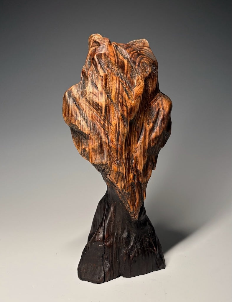 "FIRST CRUSH-XI" HAND CARVED HEMLOCK SCULPTURE