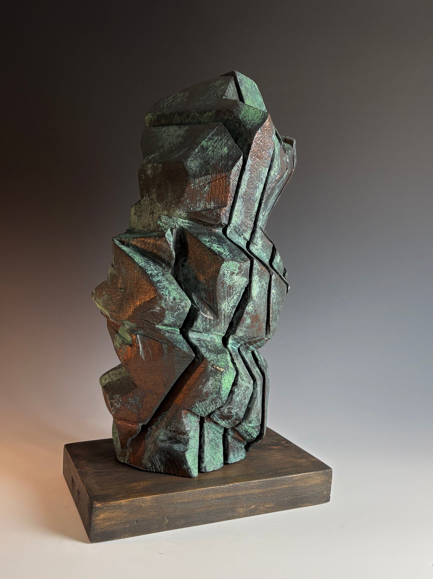 "SOLARA" HAND CARVED SPRUCE SCULPTURE WITH OXIDIZED BRONZE COATING